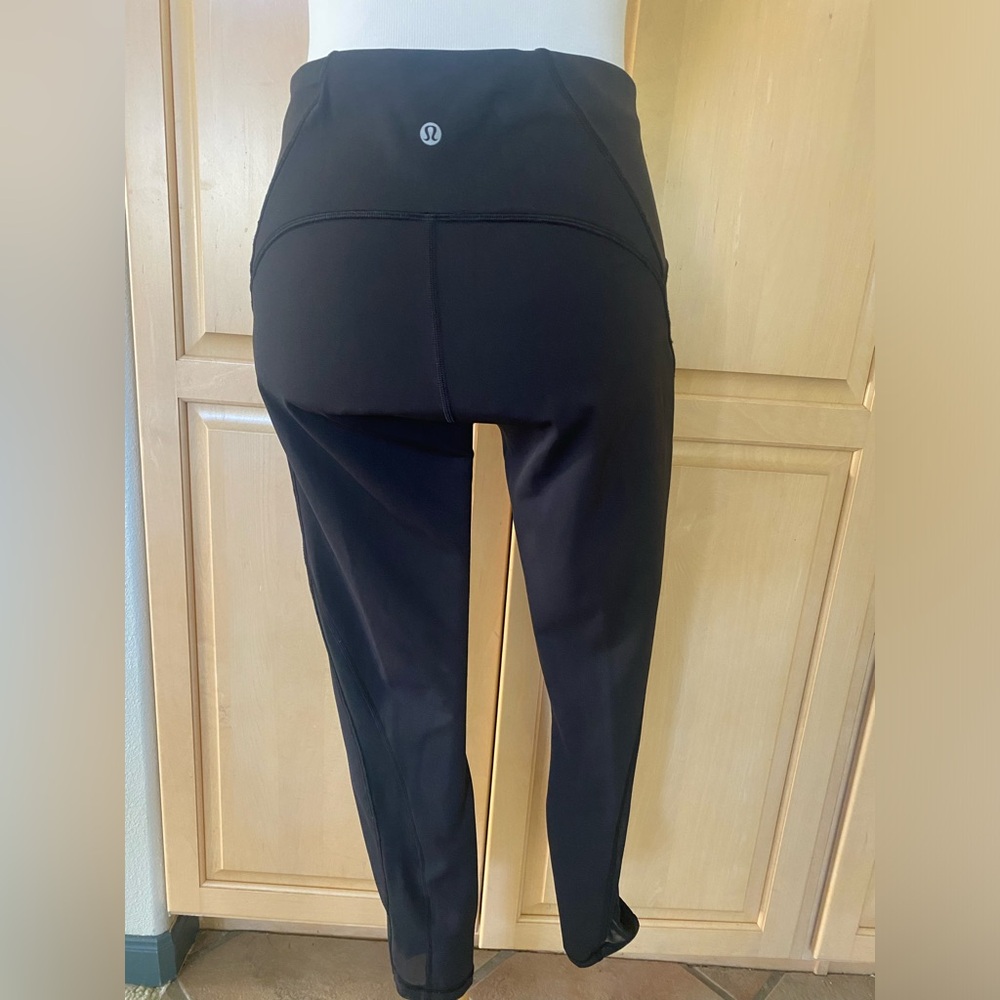 Lululemon train 3/4 black leggings sheer side panels size 10